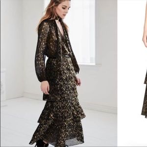 Olivia Palermo skirt and blouse ensemble.